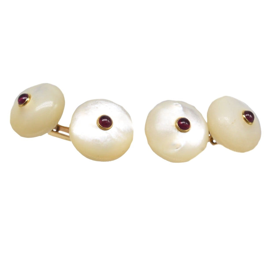 Vintage Trianon 14ct gold cufflinks featuring carved mother of pearl and round cabochon ruby for a sophisticated look.