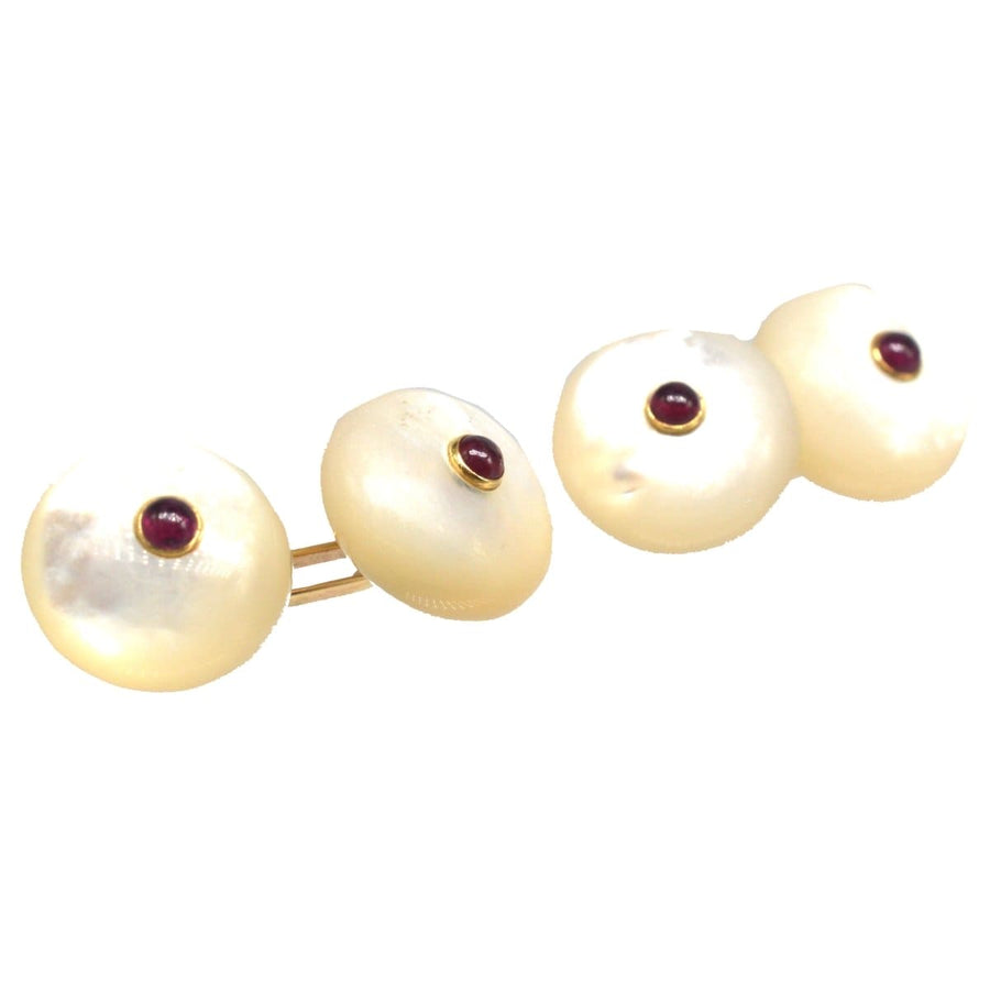 Vintage Trianon 14ct gold cufflinks with carved mother of pearl and round ruby accents.